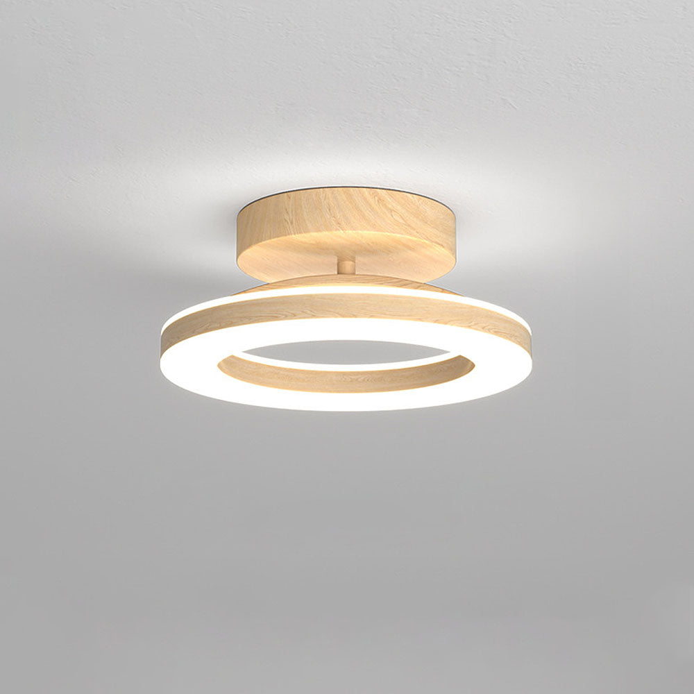 Plafonnier LED rond et élégant pour une entrée chaleureuse et moderne
