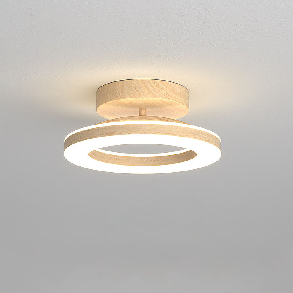 Plafonnier LED rond et élégant pour une entrée chaleureuse et moderne